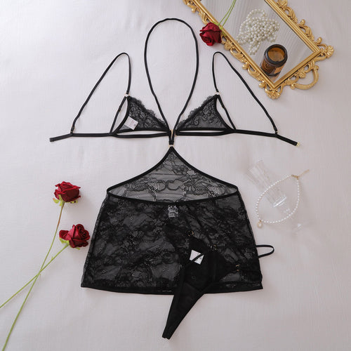 Flat lay overview of black lace 3-piece lingerie set