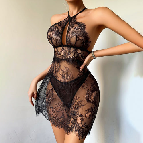 Model wearing black sheer eyelash lace halter chemise with thong