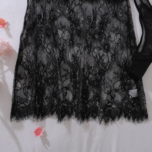 Close-up of scalloped eyelash lace hem on nightdress