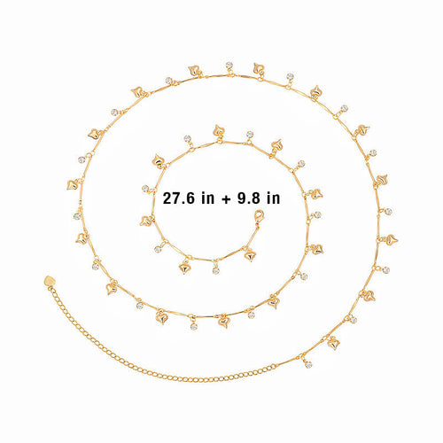 Flat lay of the delicate gold heart rhinestone belly chain coiled on a white background, displaying its adjustable length.