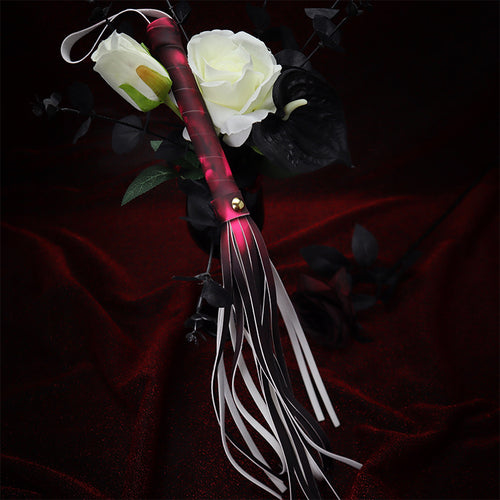 Artistic shot of color-changing whip with roses