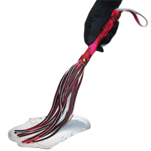 Handheld view of thermal reactive tassel whip