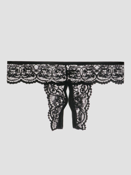 Flat lay presentation of the complete black crotchless thong, showcasing the delicate floral embroidery.