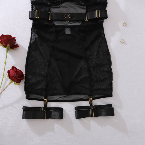 Back flat lay presentation of the KissKismet black mesh lingerie set, detailing the back clasps and adjustable garter straps.