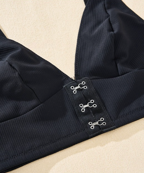 Flat lay shot of the ribbed wireless push-up bra, highlighting the high-stretch fabric and seamless craftsmanship.