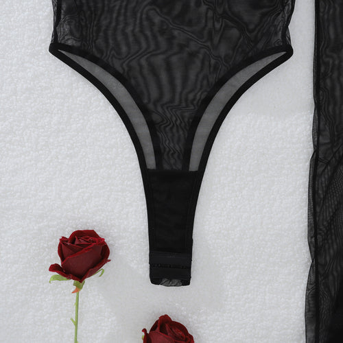 Detailed flat lay showcasing the high-cut thong back design of the KissKismet midnight illusion sheer mesh bodysuit.