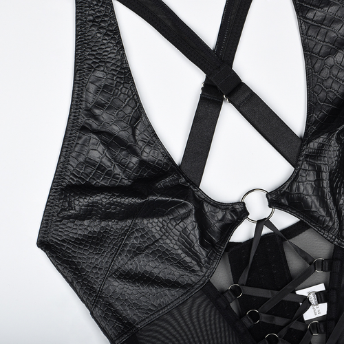 Close-up flat lay detailing the durable criss-cross back straps, O-ring hardware, and sheer mesh of the top.