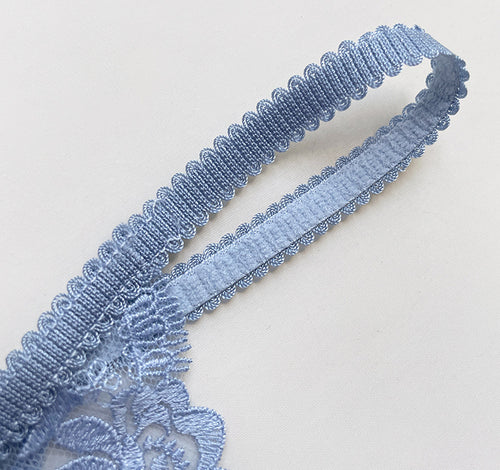 Close-up view of the ultra-soft, high-stretch double elastic side strings on the KissKismet thong.