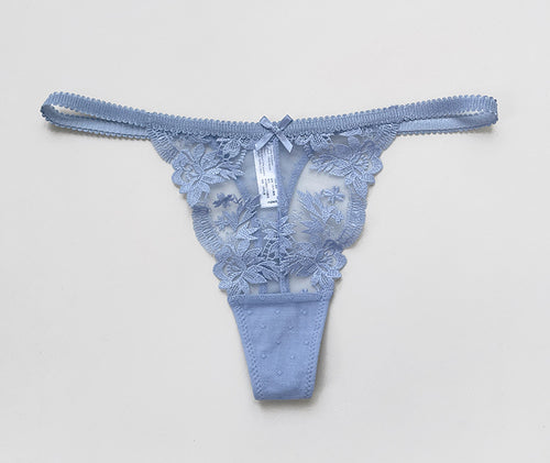 Front flat lay presentation of the KissKismet dusty blue floral lace double-strap thong on a clean background.