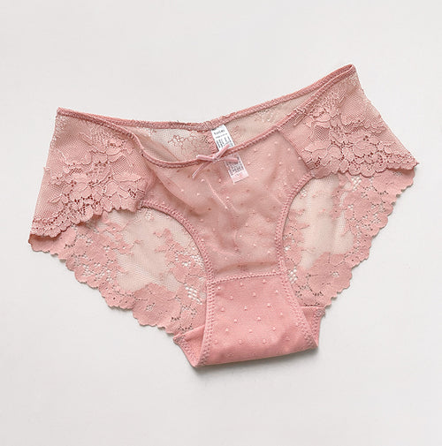 Flat lay presentation of the KissKismet dusty pink dotted mesh and lace cheeky panty on a clean white background.
