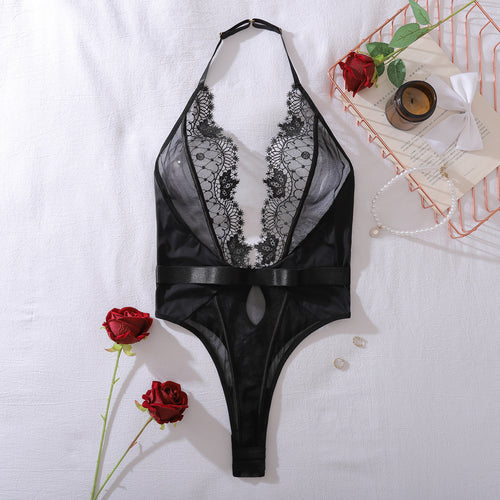 Aesthetic flat lay shot of the Ethereal Noir embroidered bodysuit, highlighting the intricate lace patterns and premium craftsmanship.