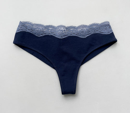 Flat lay front view of the navy modal cotton thong featuring a wide grey lace waistband on a clean background.