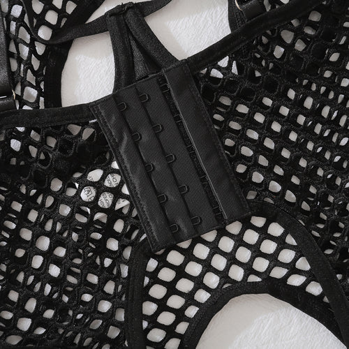 Close-up showing the secure hook-and-eye back closure for an adjustable fit on the KissKismet fishnet top.