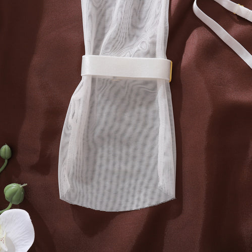 Detailed close-up of the KissKismet ivory sheer mesh thigh-high stocking, focusing on the soft, stretchy elastic top cuff.