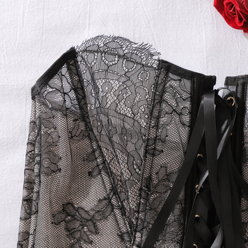 Closeup of eyelash lace trim and structural corset bodice