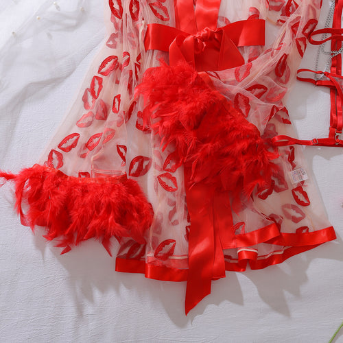 Close-up of luxury feather trim on the kiss print sheer robe