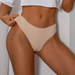 Front lifestyle view of a model wearing the KissKismet nude seamless ice silk thong, showcasing the ultra-smooth fit.