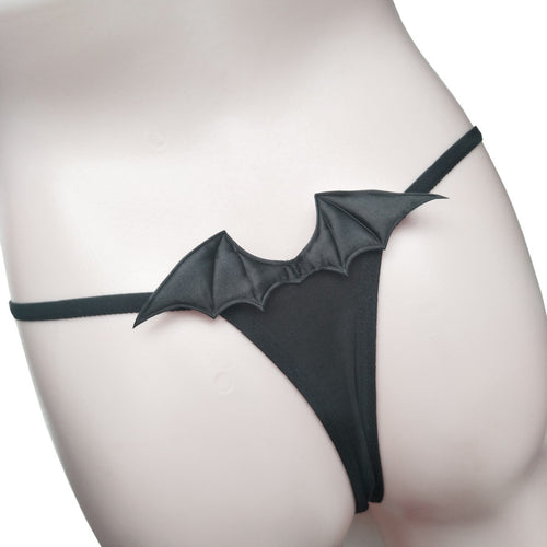 Back view of black devil wing thong on a mannequin
