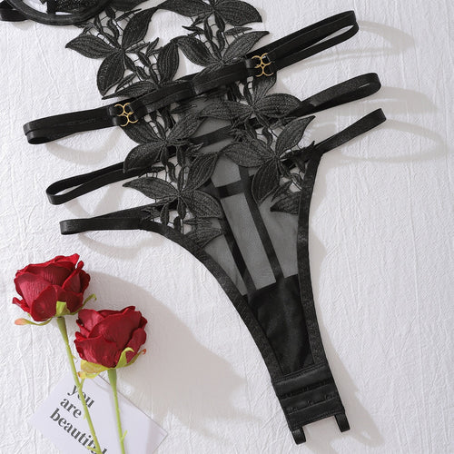 Flat lay of back straps and thong detail on floral set