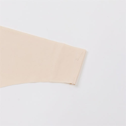Close-up view of the smooth outer crotch area of the skin-friendly nude seamless thong.