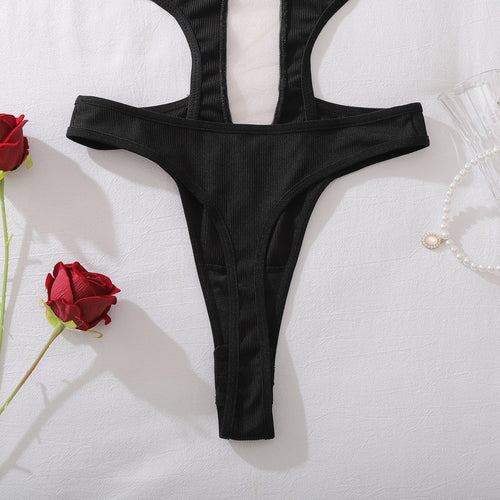 Detail of bottom strap construction on sculpting bodysuit
