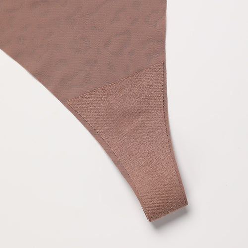 Detailed close-up flat lay of the smooth, seamless edge finish and lightweight fabric on the KissKismet nude leopard print panty.