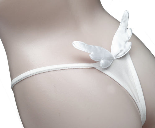 Close-up detail of plush angel wings on white lingerie