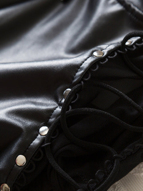 Close-up flat lay detailing the provocative side lace-up design with durable silver grommet hardware on the KissKismet bodysuit.