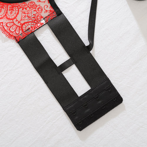 Back flat lay detail of the KissKismet garter belt, highlighting the thick, structured black elastic bands and secure hook closures.