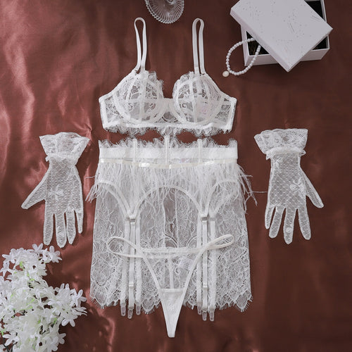 A complete illustrative flat lay of the 4-piece boudoir set on luxurious plum satin, showing all components and a gift box.