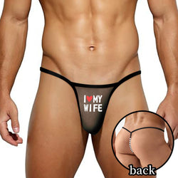 Front on-body view of a male model wearing the sheer mesh low-waist G-string featuring a bold letter print.
