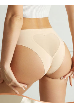 Back view of beige seamless panty featuring a large sheer heart design