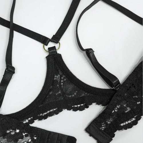 Close-up of back straps and ring hardware on lace bra